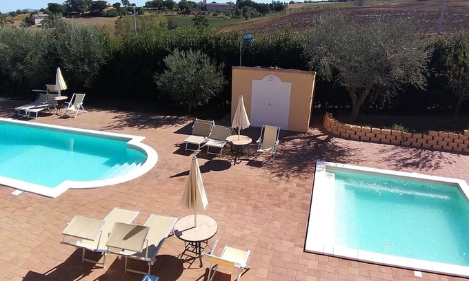 Appignano House | Vacation home of 7 apartments garden, swimming pools common lounge.Suitable for groups