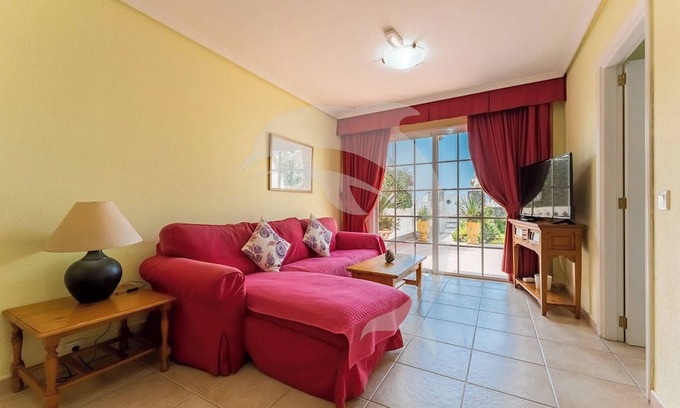 Arenas del Mar Apartment | El Médano Apartment with Pool and Garden Views