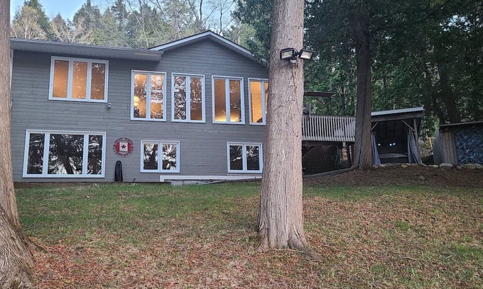 Feronia House | Beautiful home on Trout Lake with hot tub and movie room