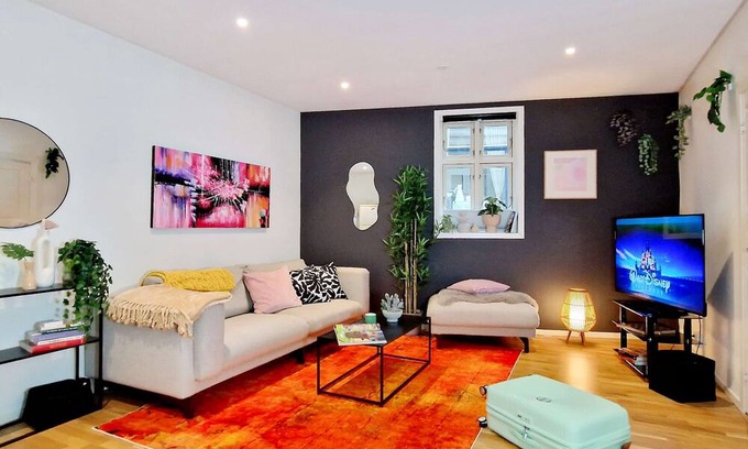 Engen Apartment | Prime location, amazing king bed, colorful oasis