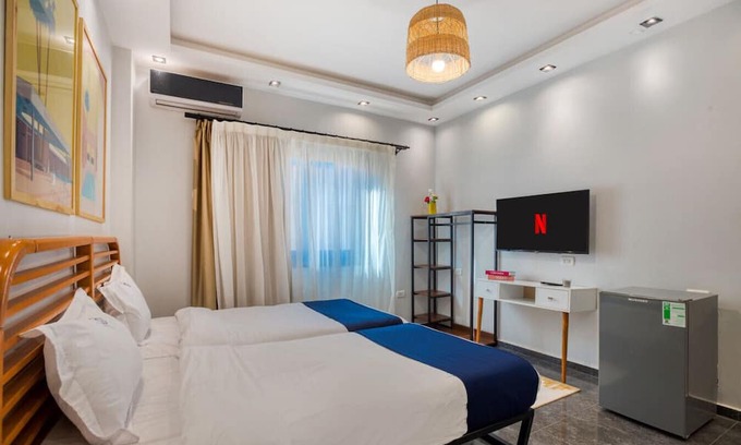 New Cairo Apartment | Compact Twin Bed Studio with City Views and Full Amenities, Near AUC